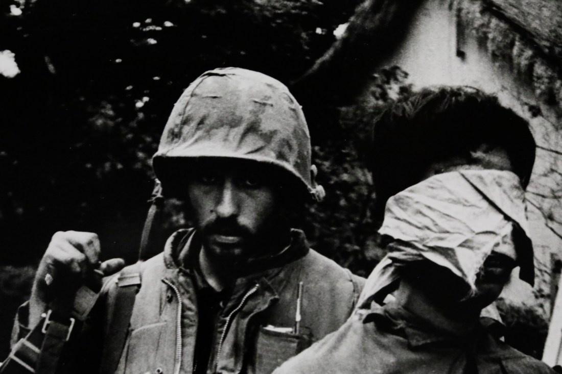 Detail - US Marine with captured North Vietnamese soldier, 1968