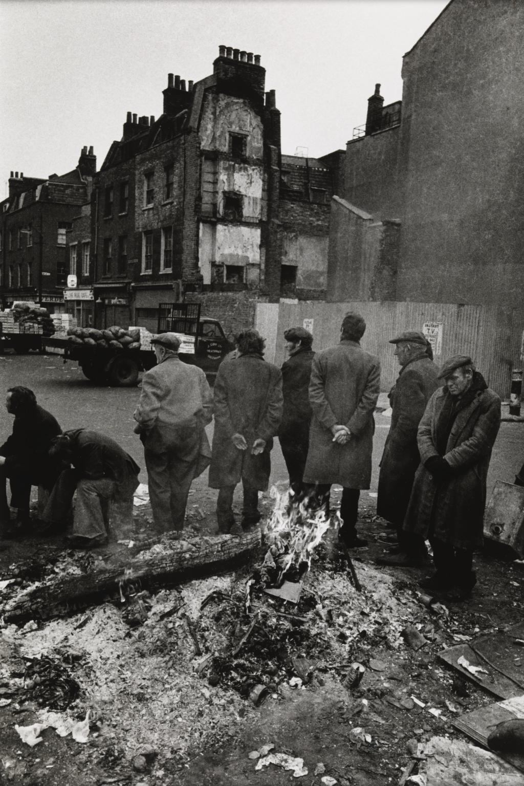 Homeless Men, Early morning in Spitalfields Market, London 1970 by Don McCullin born 1935